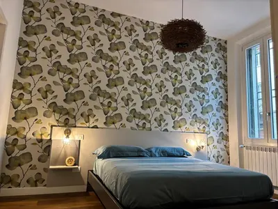 Letto o letti in una camera di Florence Tropical Suite