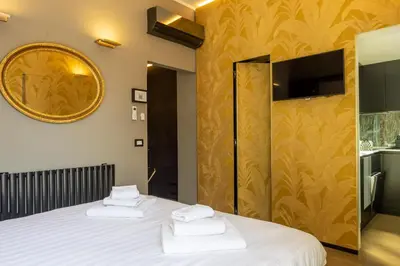 Letto o letti in una camera di Ponte Vecchio Terrace Suite with Jacuzzi