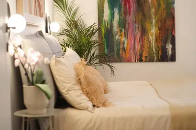 Letto o letti in una camera di Four Seasons Apartment