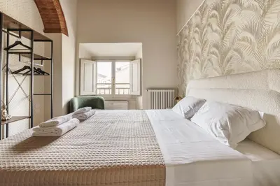 Letto o letti in una camera di Holiday AD Rondinelli, Firenze