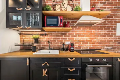 Cucina o angolo cottura di Exclusive Design Apartment