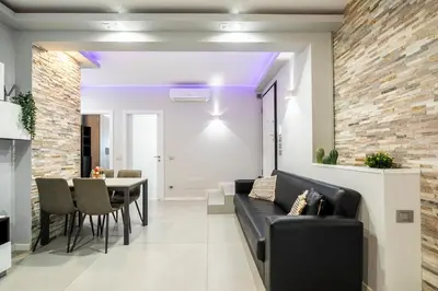 Area soggiorno di NEW - 2 Min Metro Batoni - Luxury Apt con Posto Auto