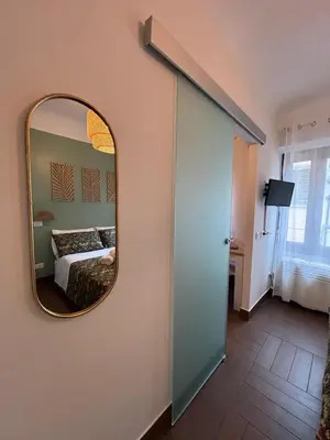 Letto o letti in una camera di La casa di Giulia
