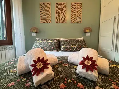 Letto o letti in una camera di La casa di Giulia