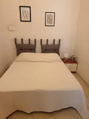 Letto o letti in una camera di Camera pressi Careggi Tramvia