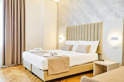 Letto o letti in una camera di Florence Medali Rooms