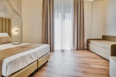 Letto o letti in una camera di Florence Medali Rooms