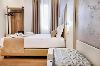 Letto o letti in una camera di Florence Medali Rooms