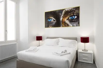 Letto o letti in una camera di Borghese Palace Luxury Apartment