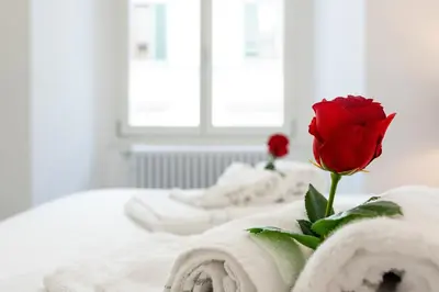 Letto o letti in una camera di Borghese Palace Luxury Apartment