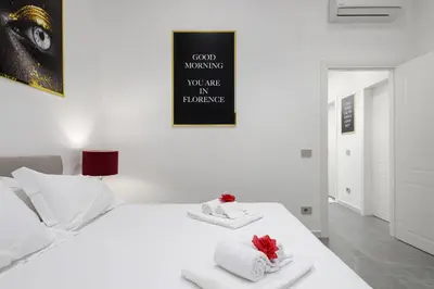 Letto o letti in una camera di Borghese Palace Luxury Apartment