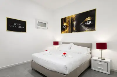 Letto o letti in una camera di Borghese Palace Luxury Apartment