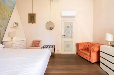 Letto o letti in una camera di Dimora storica vicino a Ponte Vecchio e Uffizi