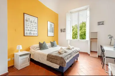 Letto o letti in una camera di Indipendenza Flat
