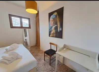 Letto o letti in una camera di Leone Flat