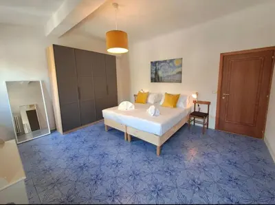 Letto o letti in una camera di Leone Flat