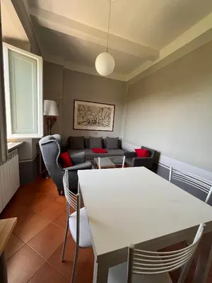 Area soggiorno di Toscana in Città - Silenzioso APT immerso nella natura