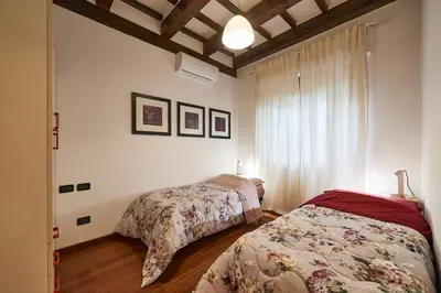 Letto o letti in una camera di Vill'Etta, the artist's home