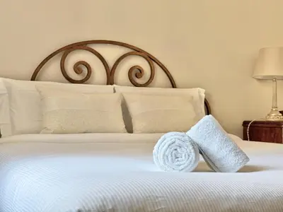 Letto o letti in una camera di GOLDEN LUXE - Incantevole appartamento ai piedi di Piazzale Michelangelo