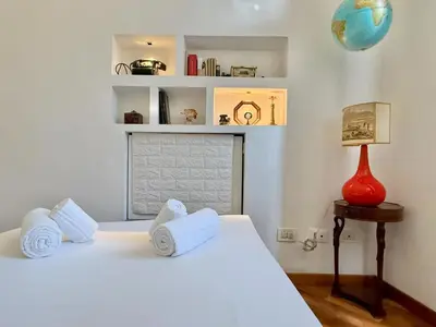 Letto o letti in una camera di GOLDEN LUXE - Incantevole appartamento ai piedi di Piazzale Michelangelo
