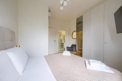 Letto o letti in una camera di BellaVita Boutique Florence