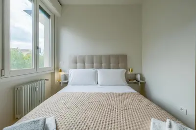 Letto o letti in una camera di BellaVita Boutique Florence