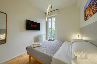 Letto o letti in una camera di BellaVita Boutique Florence