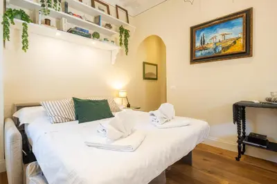Letto o letti in una camera di Tornabuoni Cozy Apartment