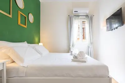 Letto o letti in una camera di Tornabuoni Cozy Apartment