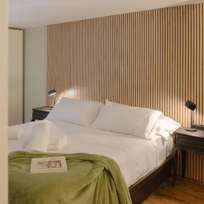 Letto o letti in una camera di Sant'Ambrogio Oasis Apartment