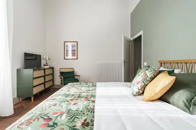 Letto o letti in una camera di Lillibeth Place - Florence Dolce Vita