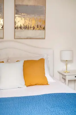 Letto o letti in una camera di Tra Duomo e Uffizi Appartamenti moderni nel cuore dell'arte
