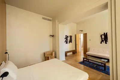 Letto o letti in una camera di Archibusieri 8 Design Home