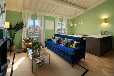 Area soggiorno di ENCHANTING PENTHOUSE with a breathtaking 360 degrees Panoramic View in the Heart of Florence