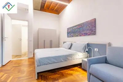 Letto o letti in una camera di Dimora Ser Lapo by TuscanyWeGo