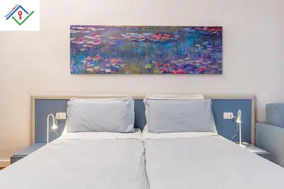 Letto o letti in una camera di Dimora Ser Lapo by TuscanyWeGo