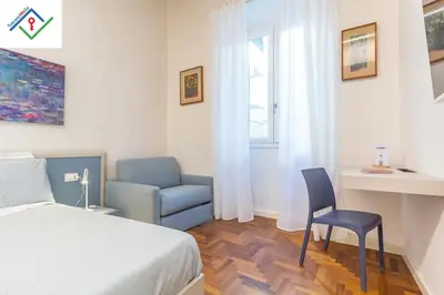 Letto o letti in una camera di Dimora Ser Lapo by TuscanyWeGo