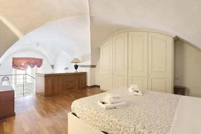 Letto o letti in una camera di Historic Loft in the Heart of Florence