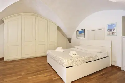 Letto o letti in una camera di Historic Loft in the Heart of Florence