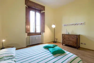 Letto o letti in una camera di The Italian Courtyard with free parking nearby
