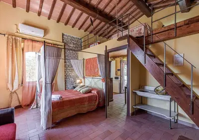 Letto o letti in una camera di Chianti Experience - Villa Smeraldo