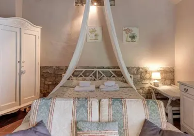 Letto o letti in una camera di Chianti Experience - Villa Zaffiro