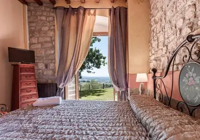 Letto o letti in una camera di Wine Experience - Villa Aurora - Villa Rubino