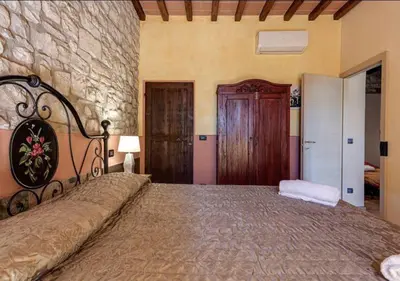 Letto o letti in una camera di Wine Experience - Villa Aurora - Villa Rubino