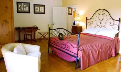 Letto o letti in una camera di Le Corti - Agriturismo Olio e Vino