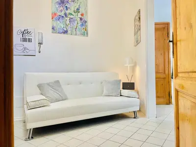 Area soggiorno di Tiny Apartment 8