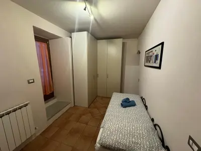 Letto o letti in una camera di Appartamento Patina Oliveto