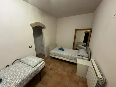 Letto o letti in una camera di Appartamento Patina Oliveto