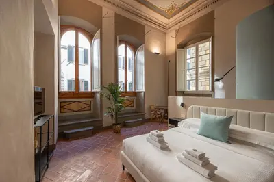 Letto o letti in una camera di Maggio Living