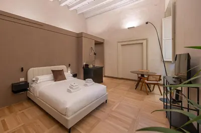 Letto o letti in una camera di Maggio Living